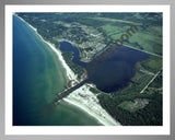 Aerial image of [4249] Arcadia Lake in Manistee, MI with Silver Metal frame