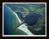 Aerial image of [4249] Arcadia Lake in Manistee, MI with Black Wood frame