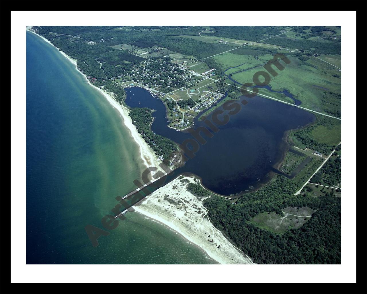 Aerial image of [4249] Arcadia Lake in Manistee, MI with Black Metal frame