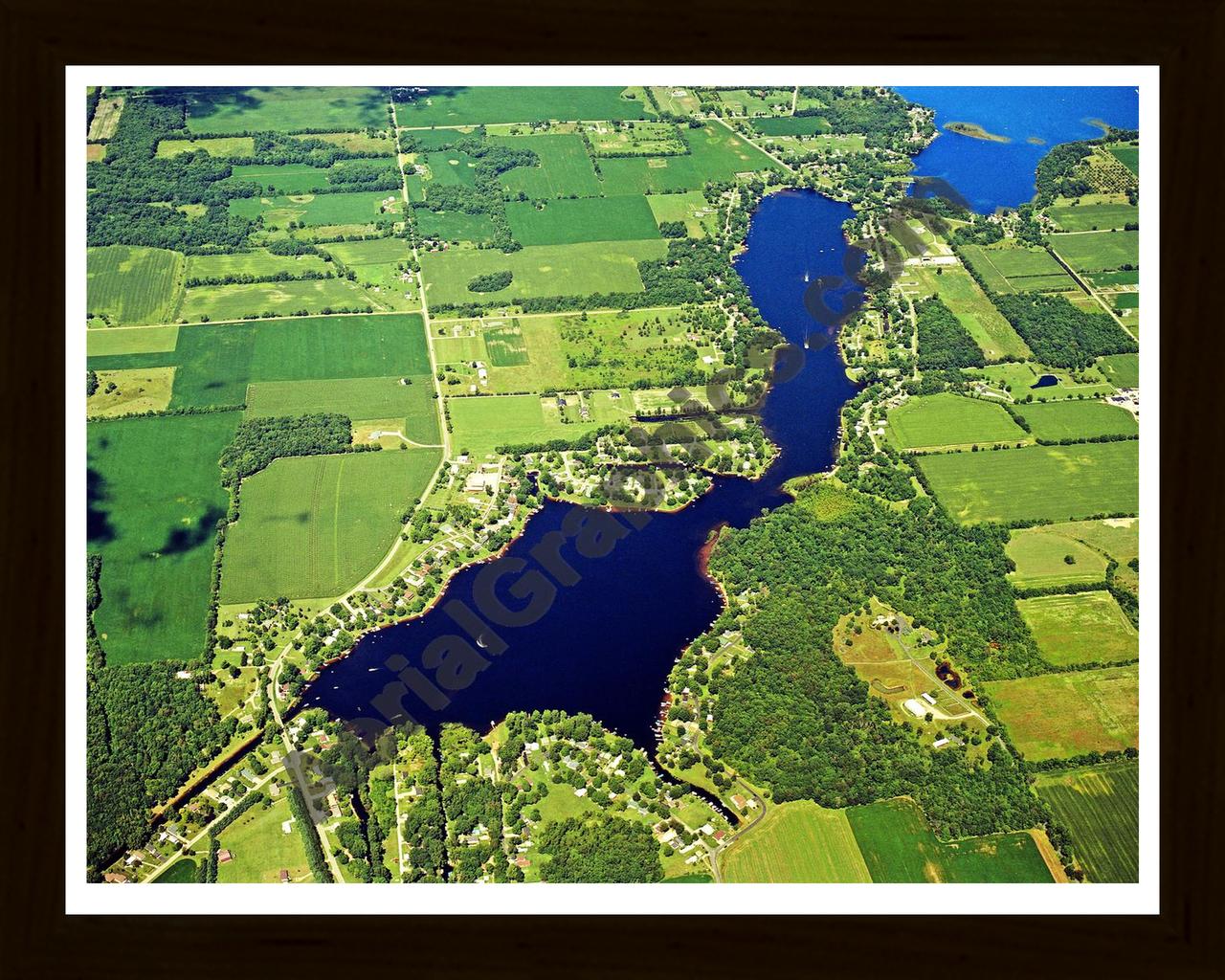 Aerial image of [4267] Middle, Archer, & Bartholomew Lake in Branch, MI with Black Wood frame