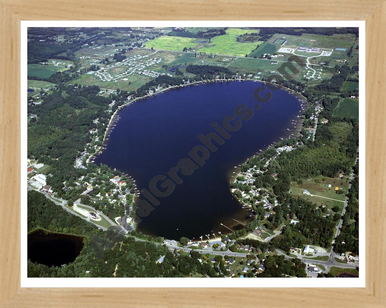 Aerial image of [4279] Bostwick Lake in Kent, MI with Natural Wood frame