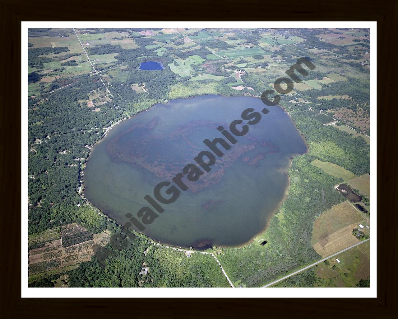 Aerial image of [4283] Round Lake in Mason, MI with Black Wood frame