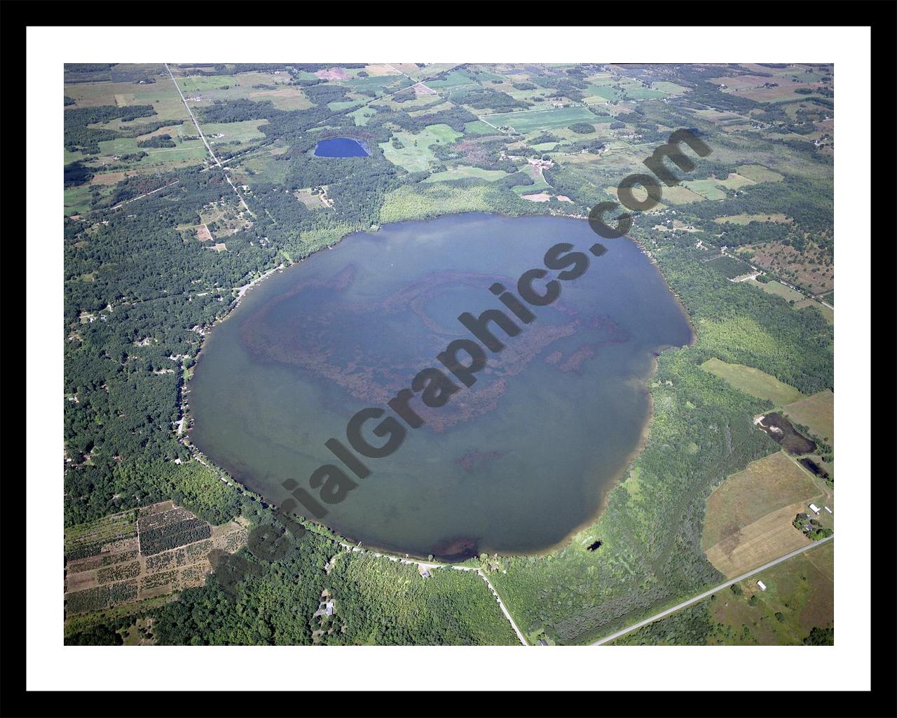 Aerial image of [4283] Round Lake in Mason, MI with Black Metal frame