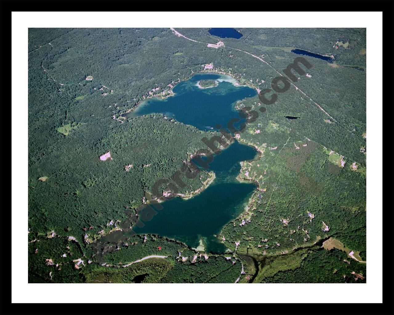 Aerial image of [4292] Emerald Lake & Sylvan Lake in Newaygo, MI with Black Metal frame