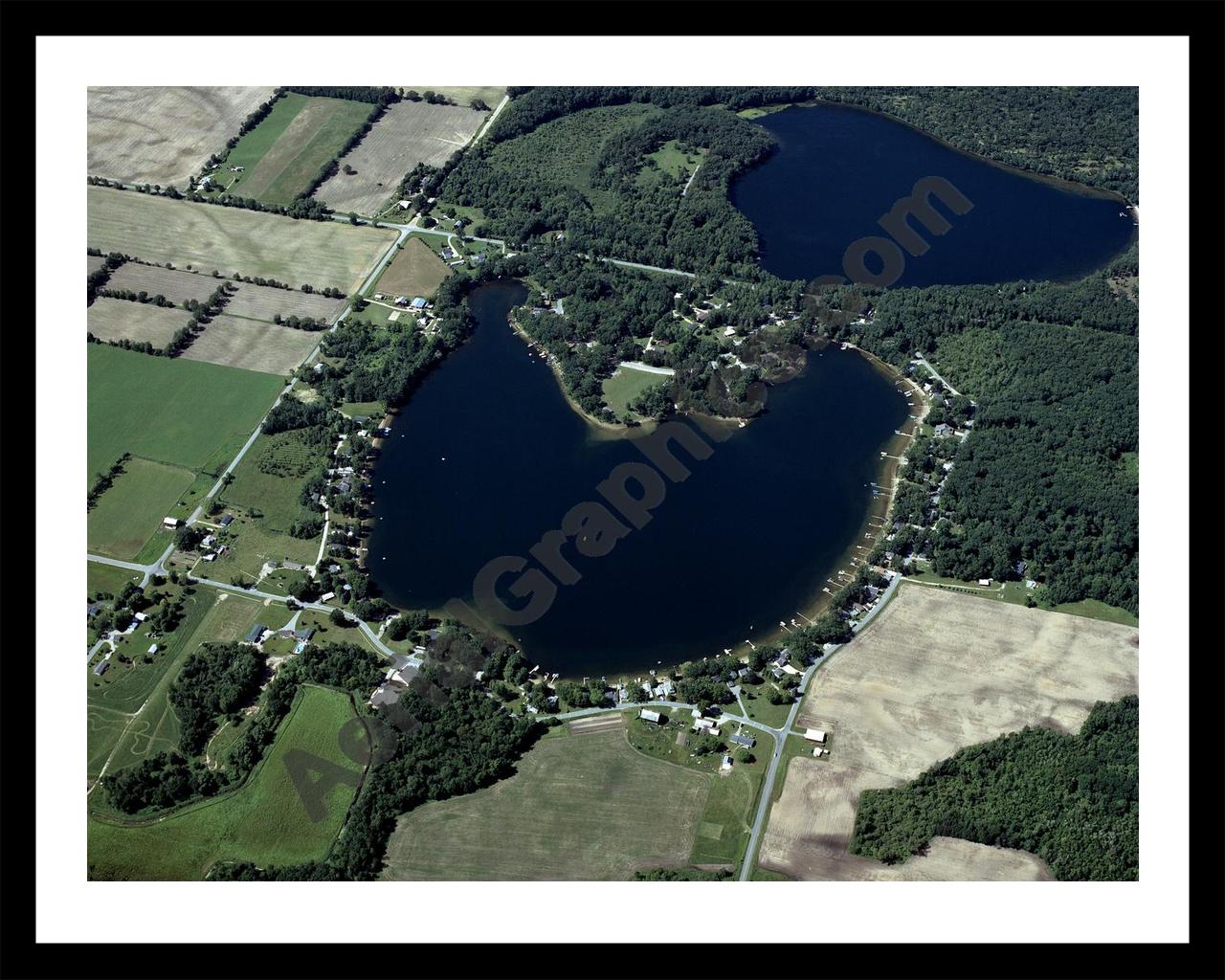 Aerial image of [4298] Baptist Lake in Newaygo, MI with Black Metal frame