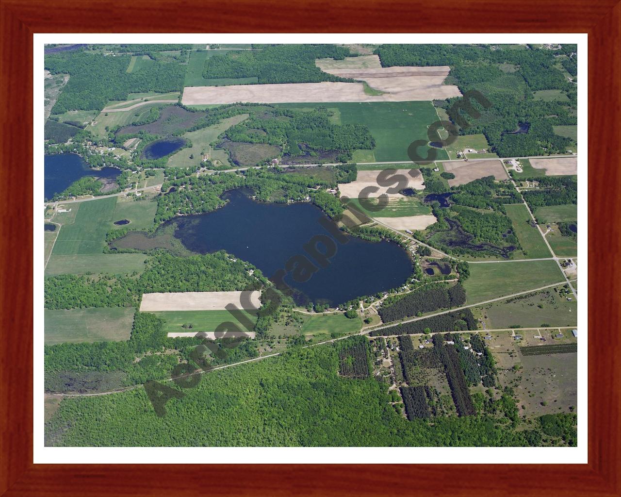 Aerial image of [42] Bass Lake (Richland Twp) in Montcalm, MI with Cherry Wood frame