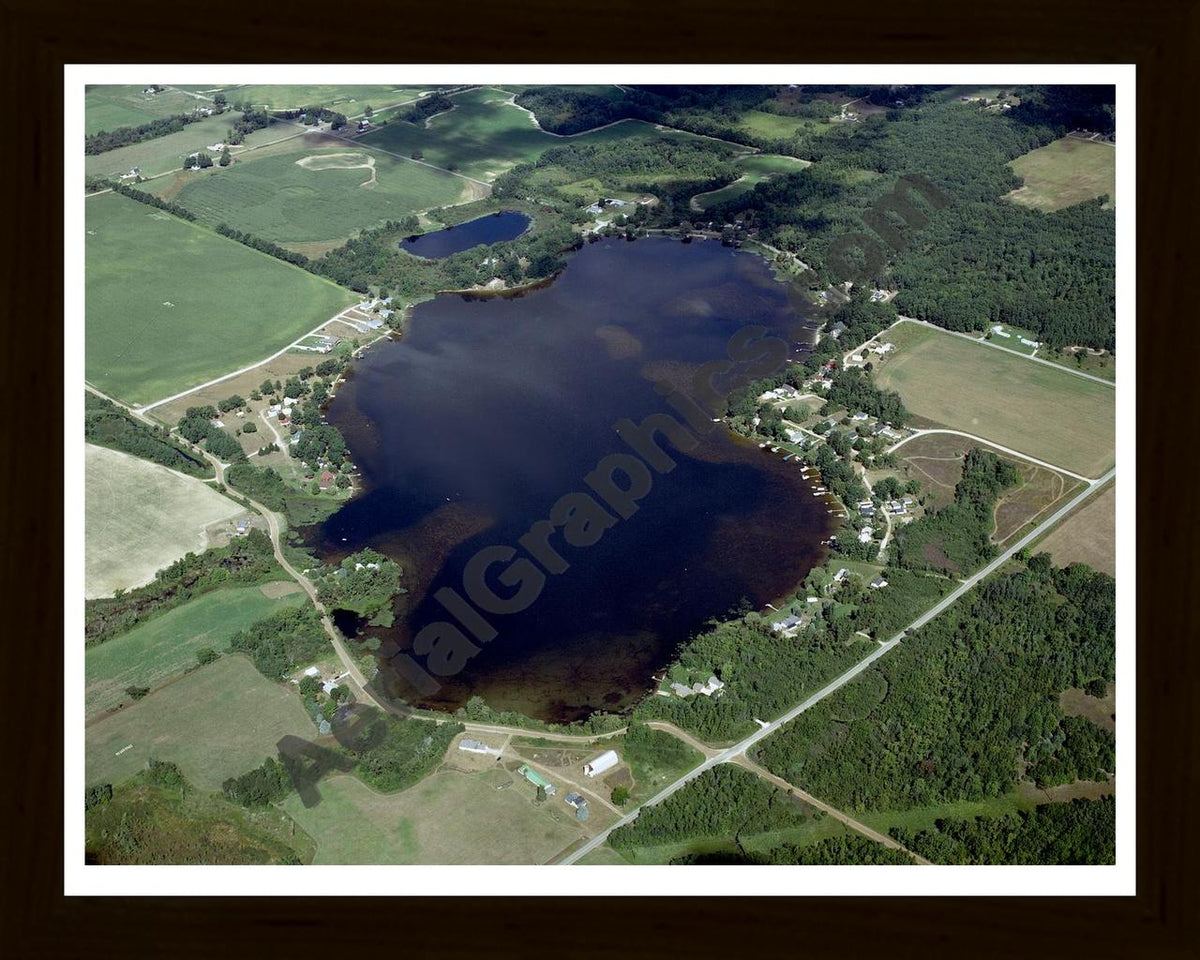 Aerial image of [4310] Winfield Lake in Montcalm, MI with Black Wood frame