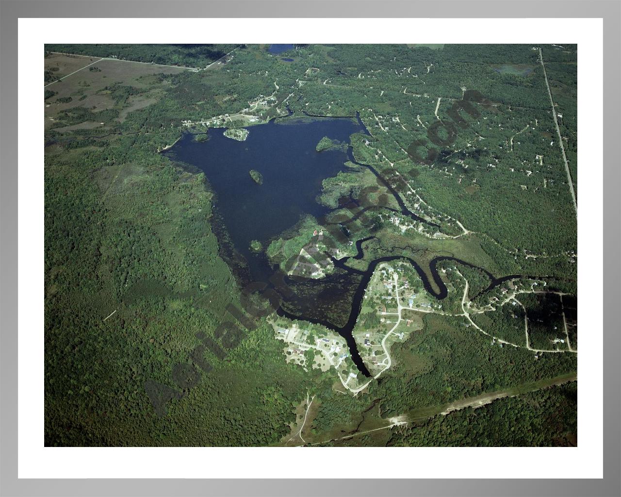 Aerial image of [4324] Doc and Tom Lake in Clare, MI with Silver Metal frame