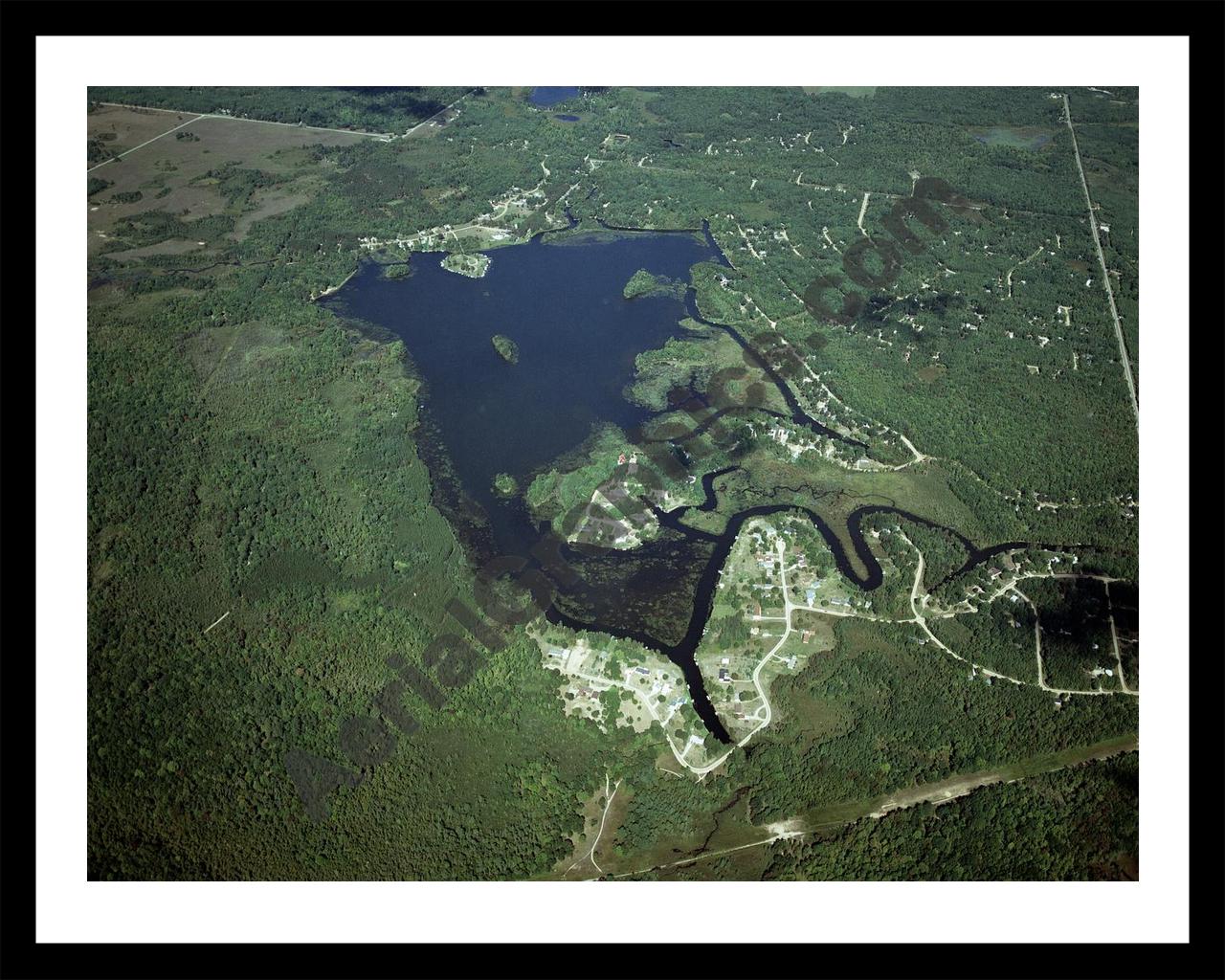 Aerial image of [4324] Doc and Tom Lake in Clare, MI with Black Metal frame