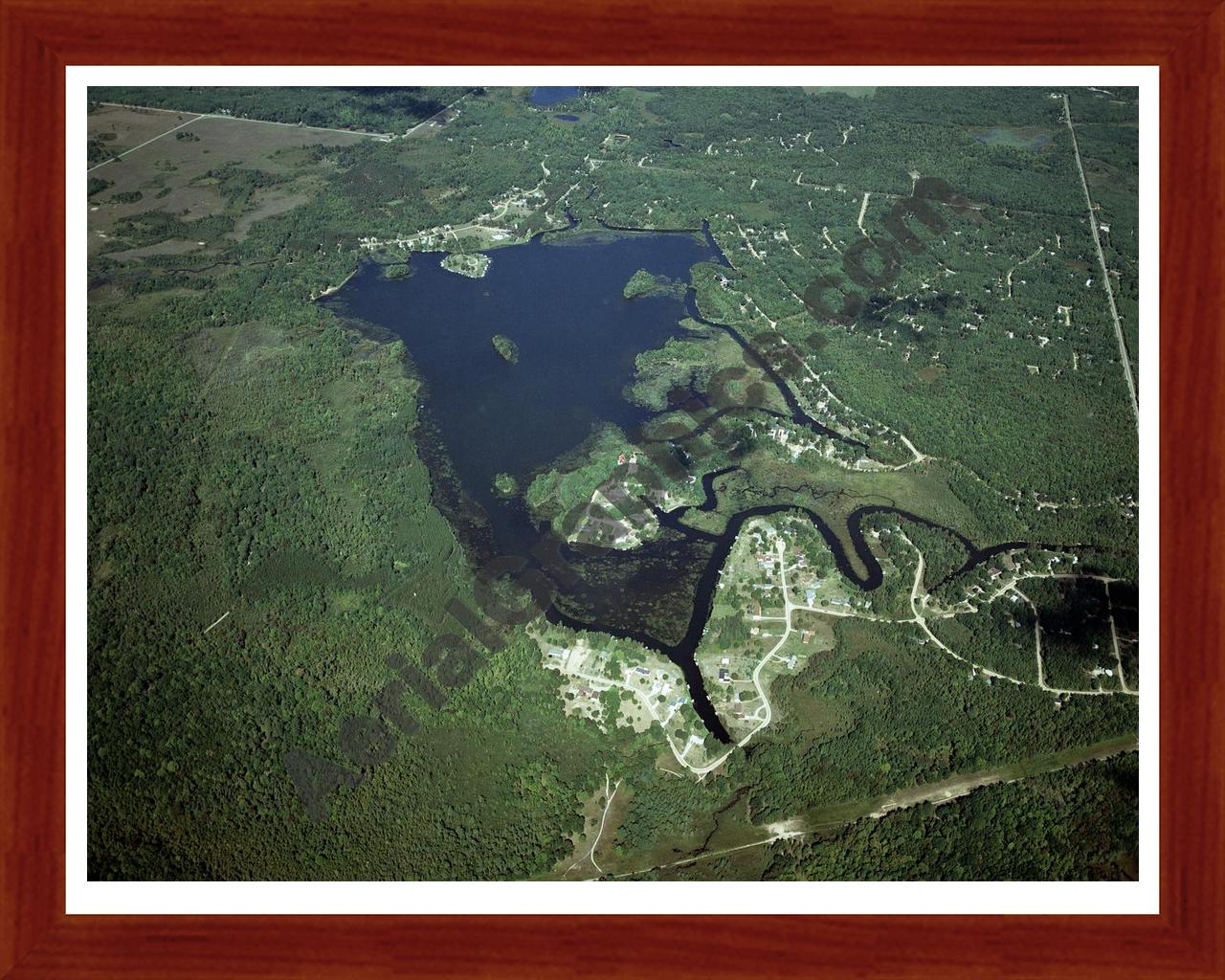 Aerial image of [4324] Doc and Tom Lake in Clare, MI with Cherry Wood frame