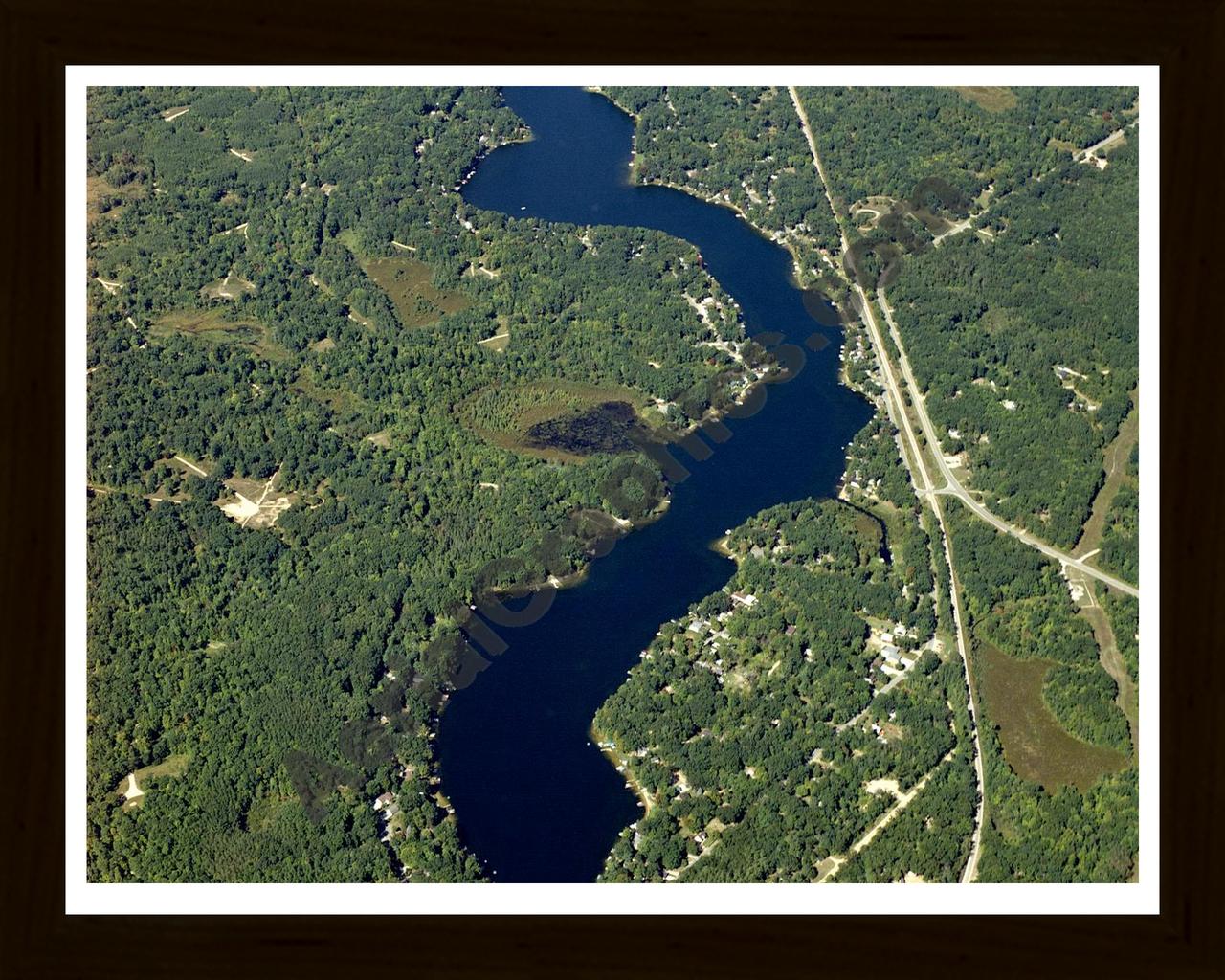 Aerial image of [4325] Lake George in Clare, MI with Black Wood frame