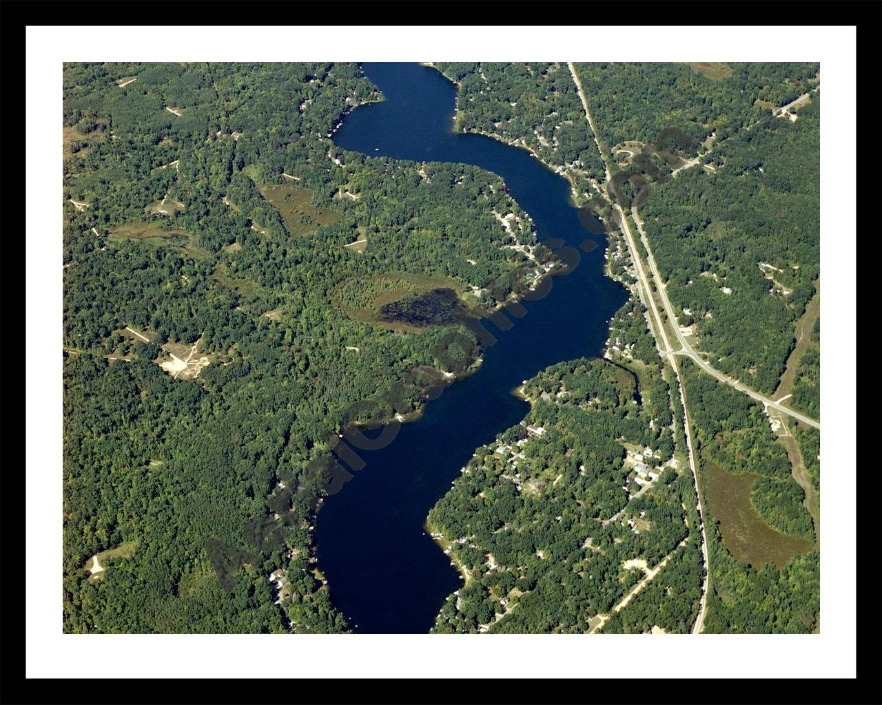 Aerial image of [4325] Lake George in Clare, MI with Black Metal frame