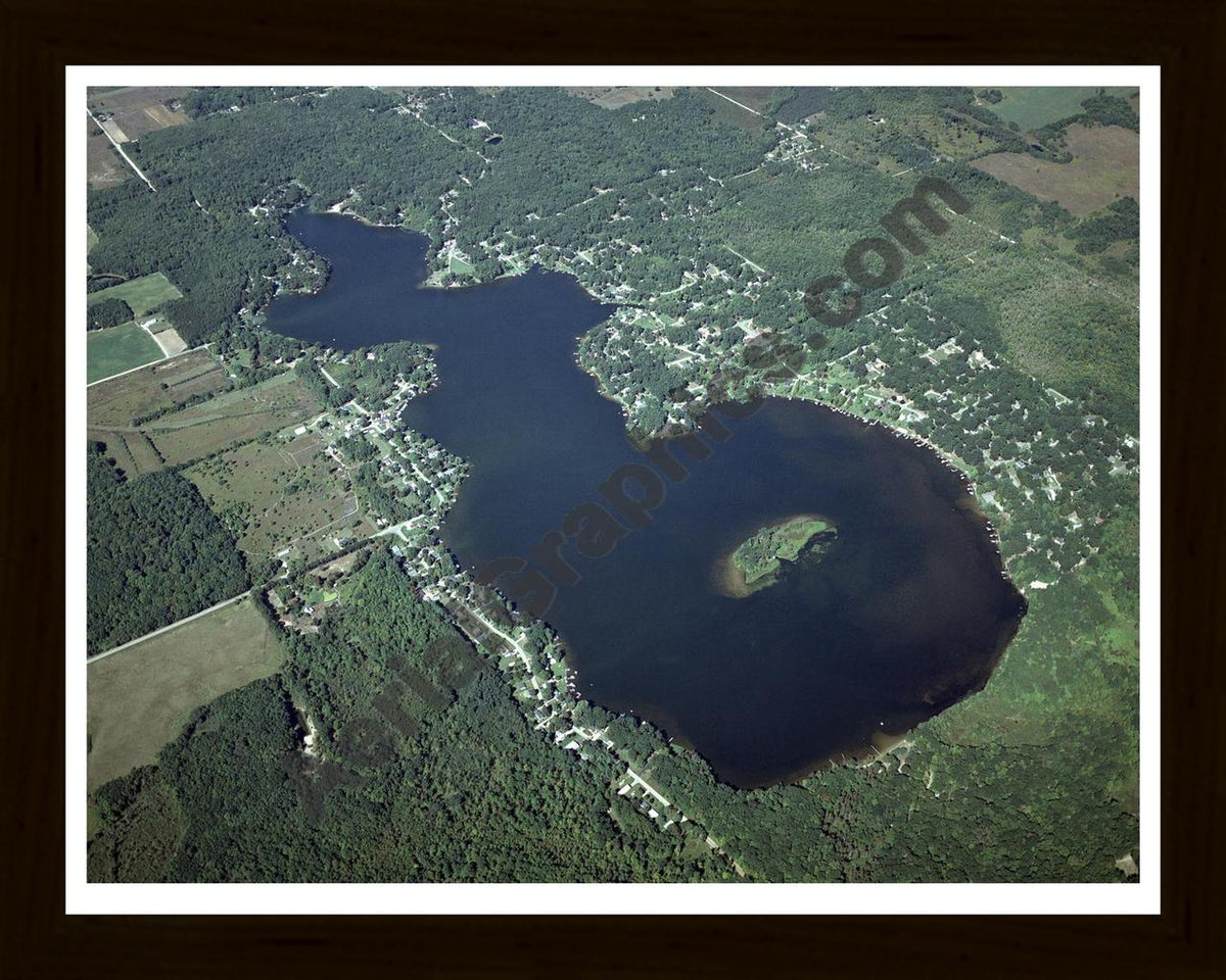 Aerial image of [4332] Townline Lake in Montcalm, MI with Black Wood frame