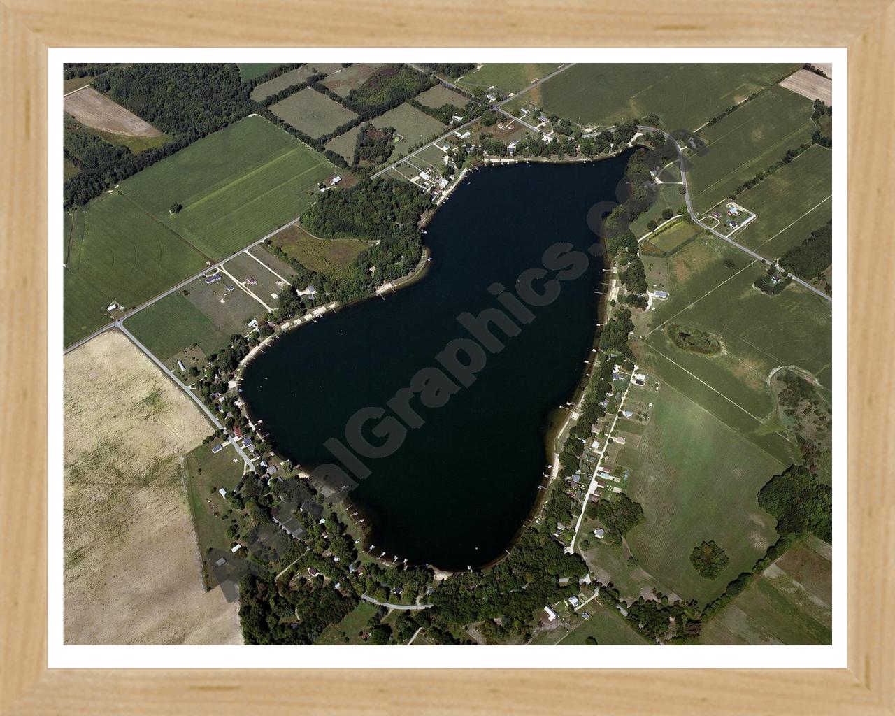 Aerial image of [4339] Cowden Lake in Montcalm, MI with Natural Wood frame