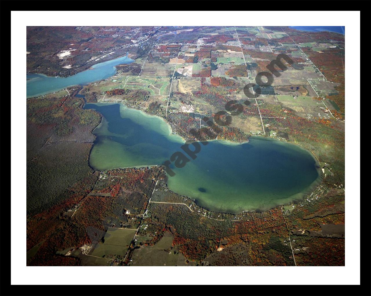 Aerial image of [4359] Pickerel Lake in Emmet, MI with Black Metal frame