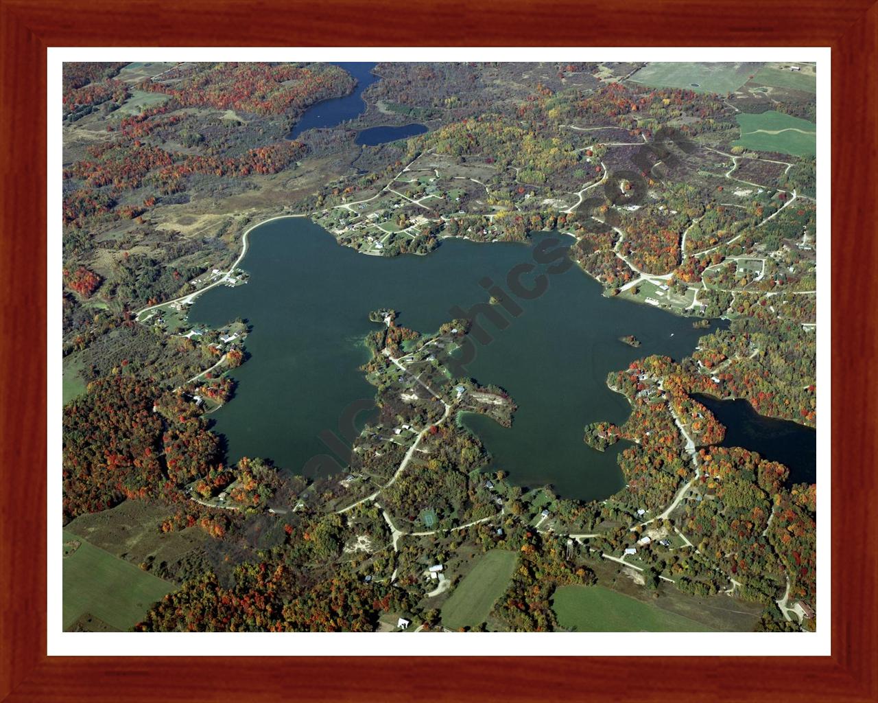 Aerial image of [4360] Miramichi Lake in Osceola, MI with Cherry Wood frame