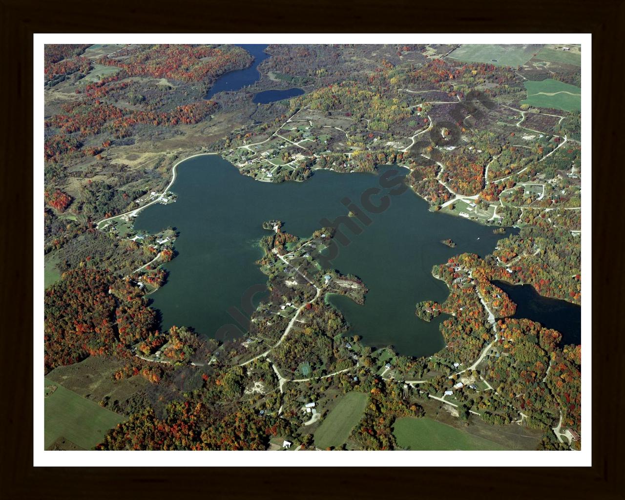 Aerial image of [4360] Miramichi Lake in Osceola, MI with Black Wood frame