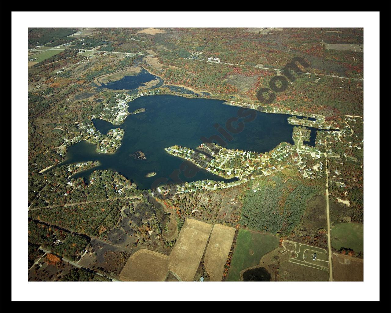 Aerial image of [4368] Indian Lake in Montcalm, MI with Black Metal frame