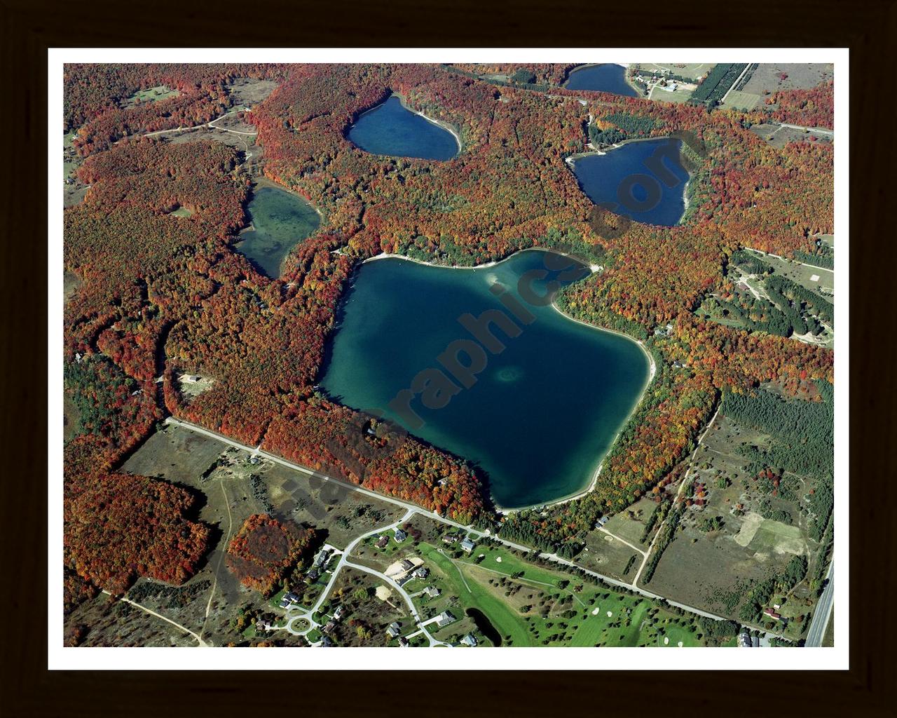 Aerial image of [4468] Lake Twentyseven in Otsego, MI with Black Wood frame