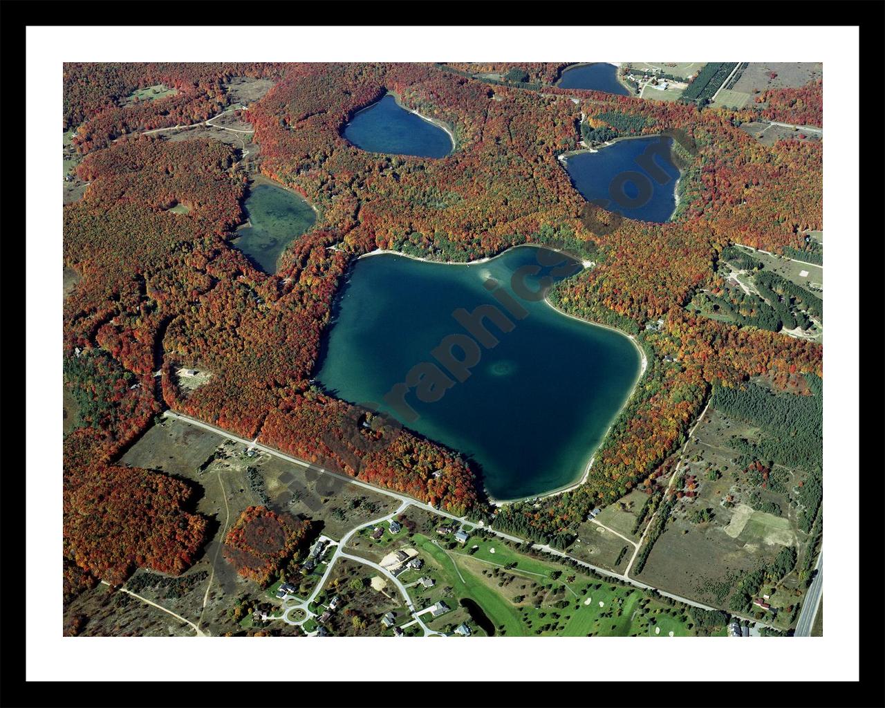 Aerial image of [4468] Lake Twentyseven in Otsego, MI with Black Metal frame