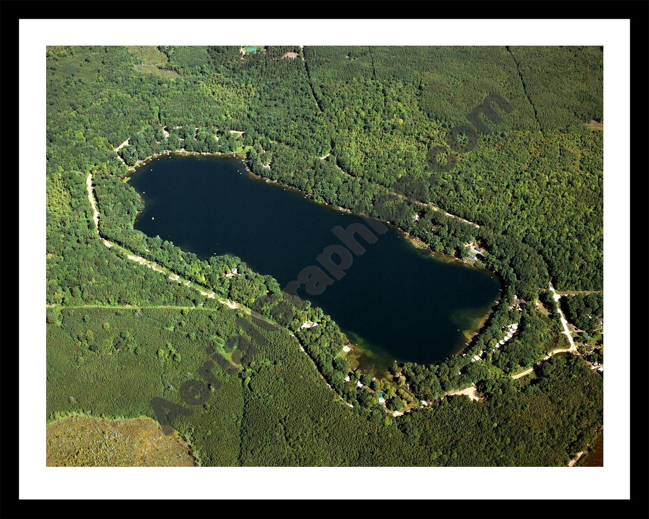 Aerial image of [4497] Blue Lake in Mason, MI with Black Metal frame