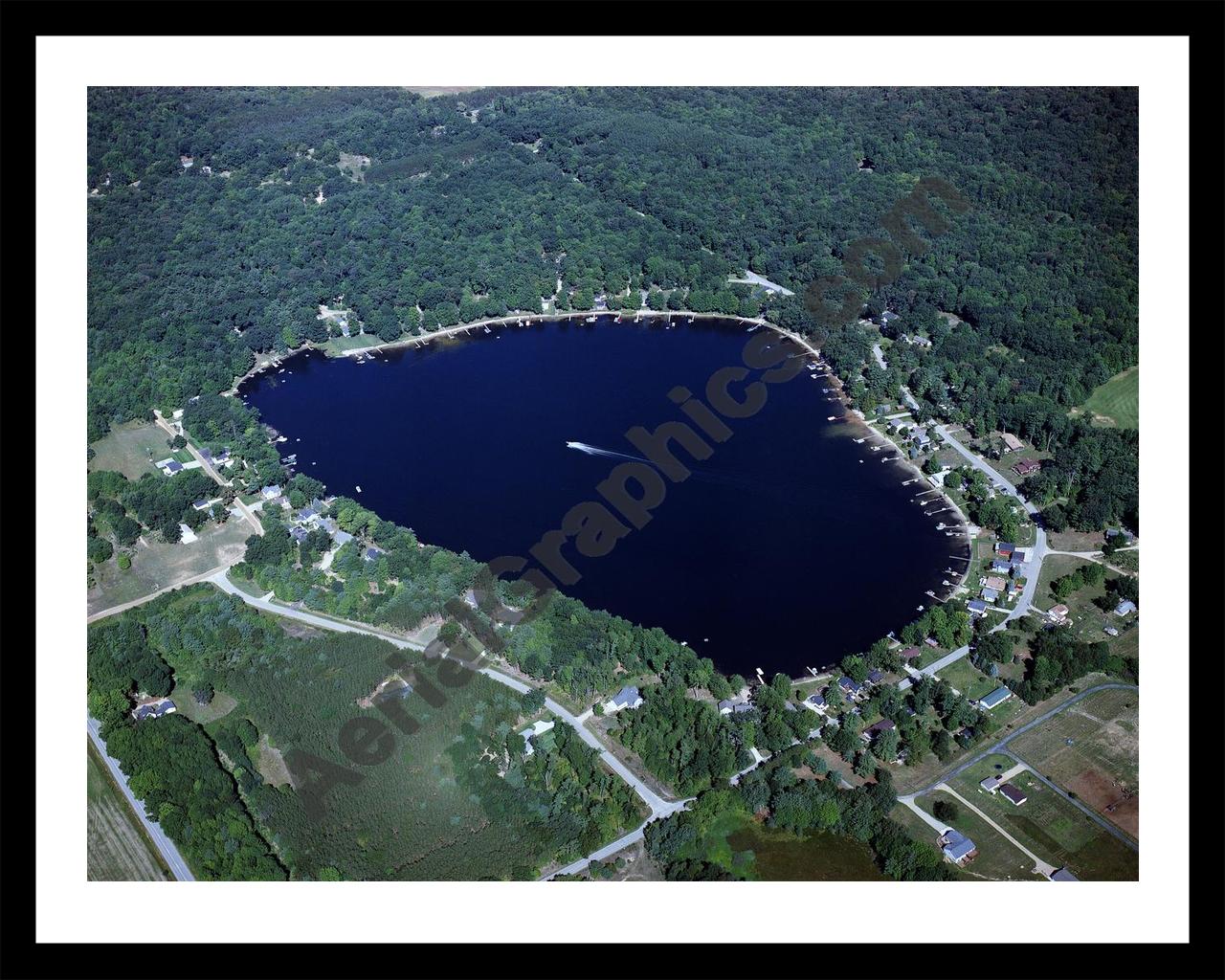 Aerial image of [4557] Sand Lake in Newaygo, MI with Black Metal frame