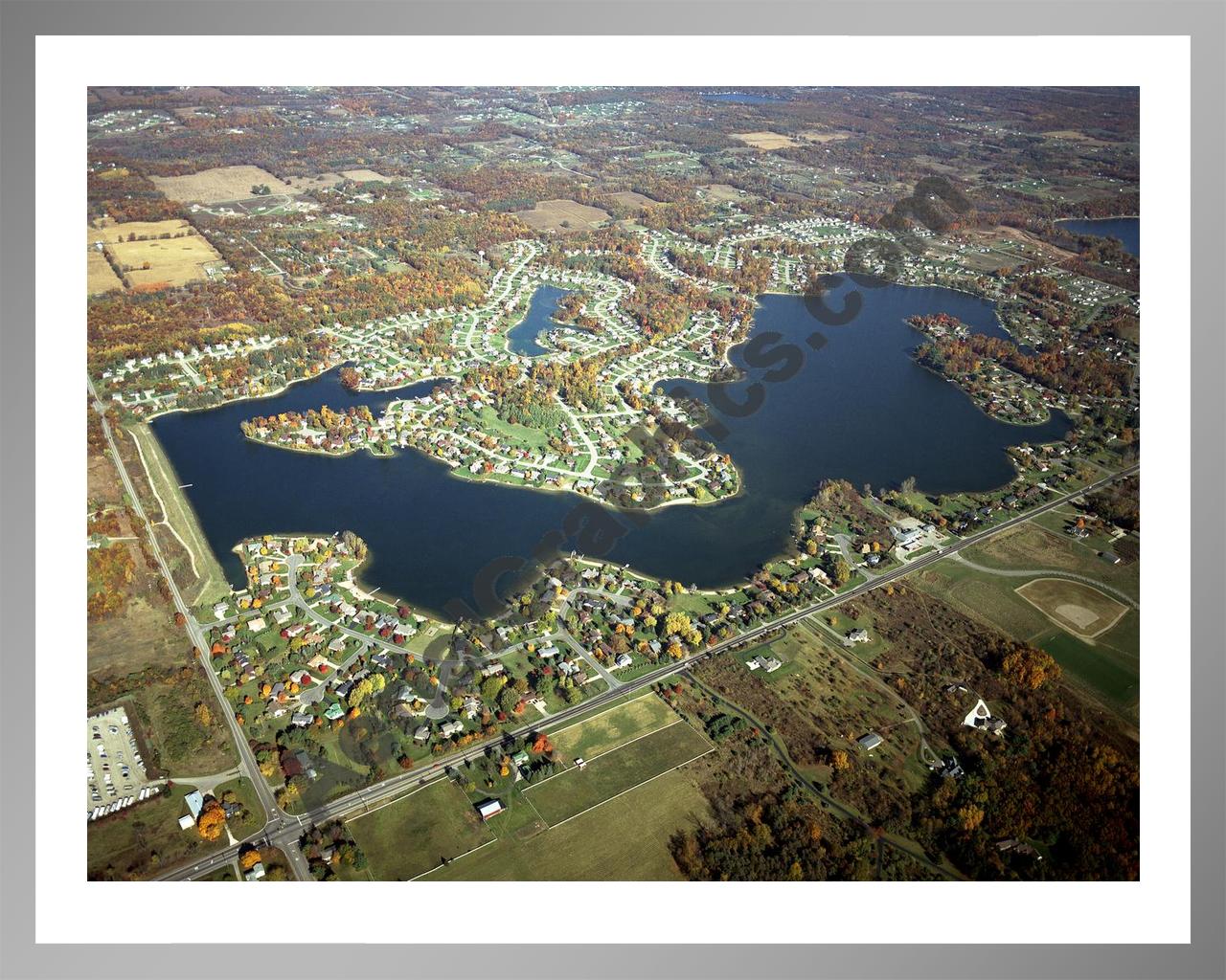 Aerial image of [4561] Lake Bella Vista (Fall) in Kent, MI with Silver Metal frame