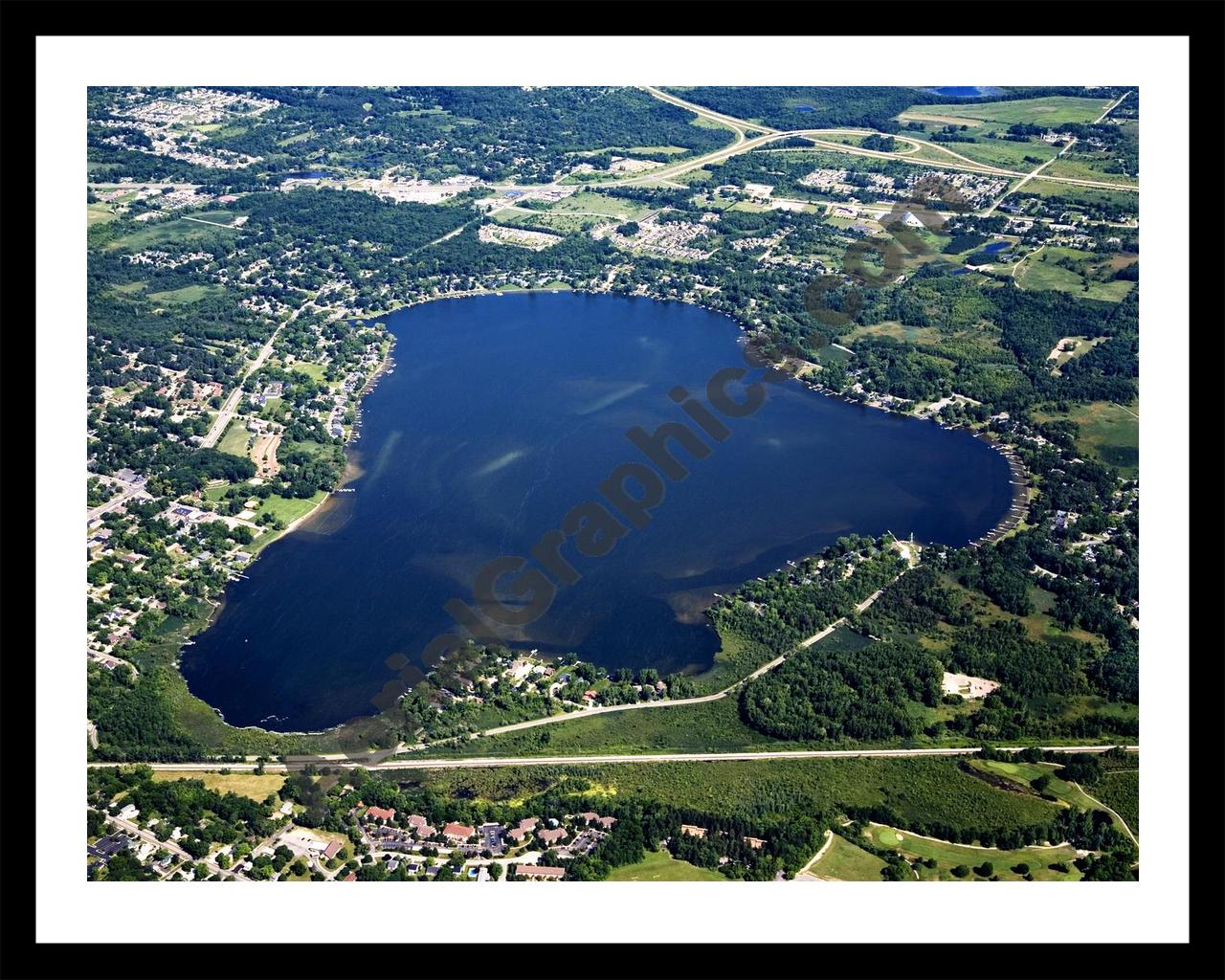 Aerial image of [4666] Lake Lansing in Ingham, MI with Black Metal frame