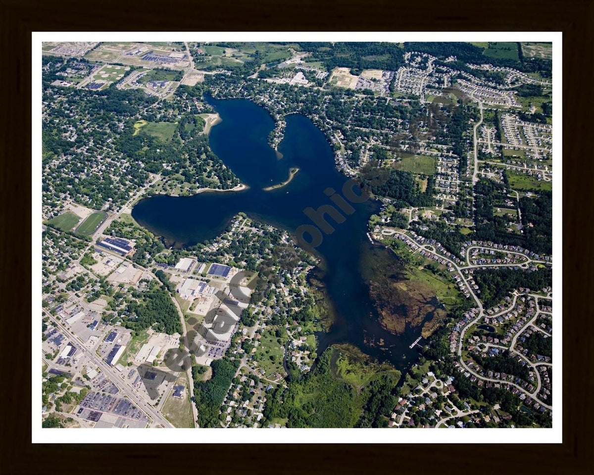 Aerial image of [4667] Thompson Lake in Livingston, MI with Black Wood frame