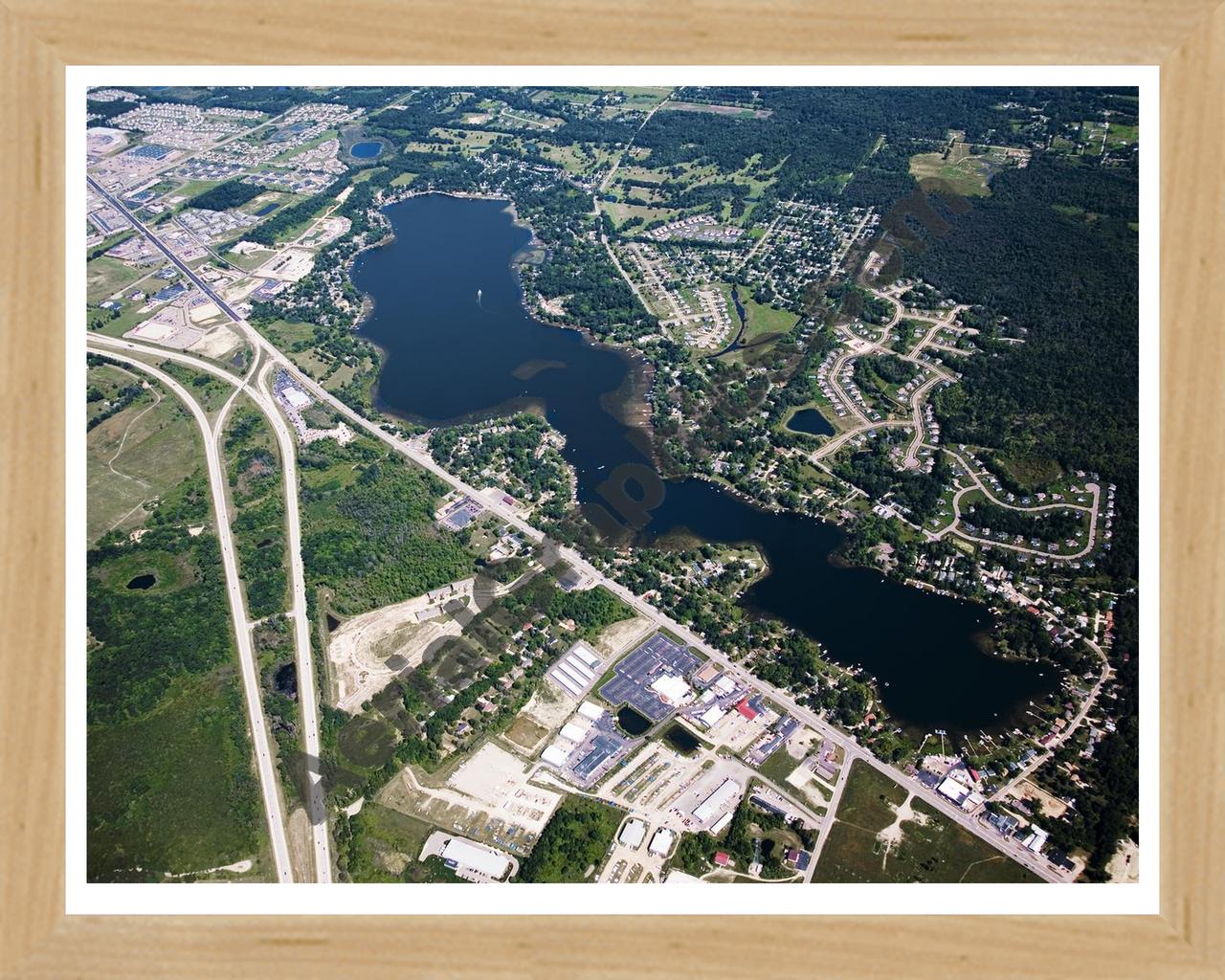 Aerial image of [4668] Lake Chemung in Livingston, MI with Natural Wood frame