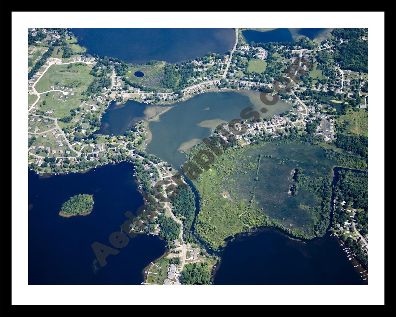 Aerial image of [4676] Squaw Lake in Genesee, MI with Black Metal frame