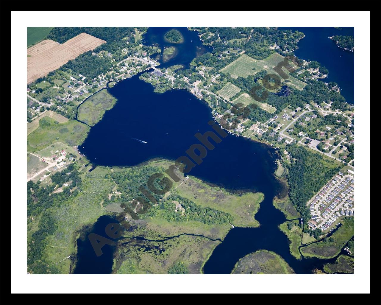 Aerial image of [4679] Bennett Lake in Livingston, MI with Black Metal frame