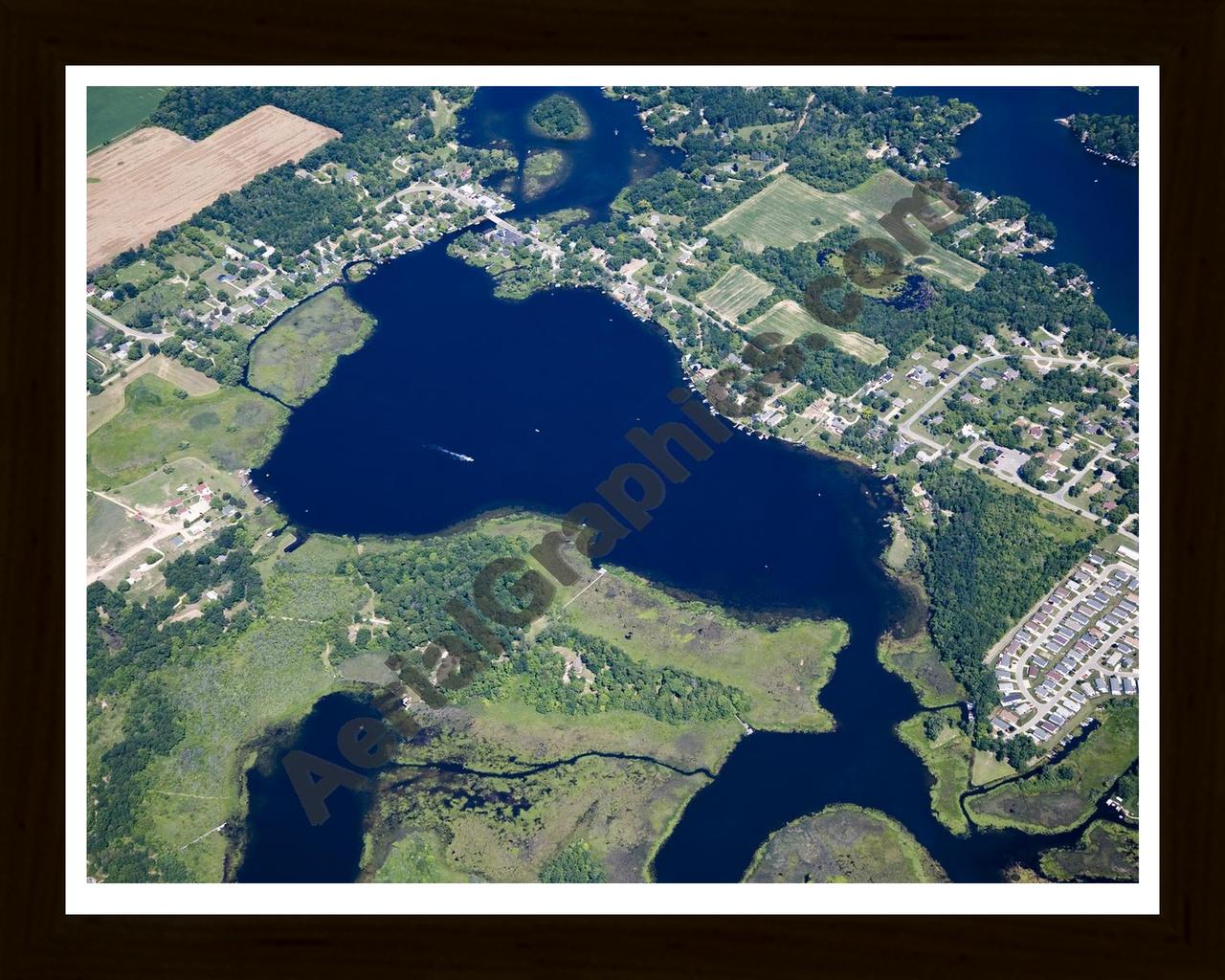 Aerial image of [4679] Bennett Lake in Livingston, MI with Black Wood frame