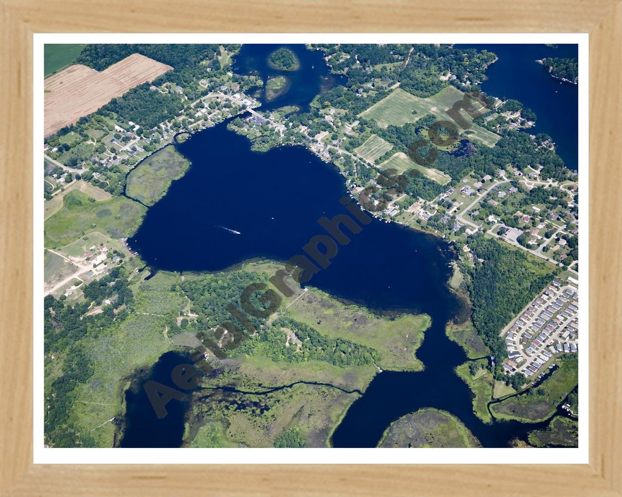 Aerial image of [4679] Bennett Lake in Livingston, MI with Natural Wood frame