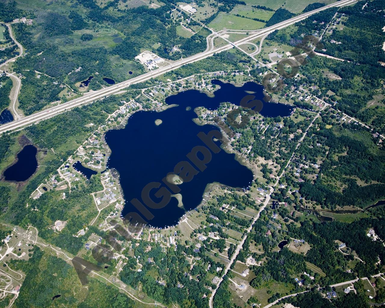 Aerial image of [4680] Runyan Lake in Livingston, MI with Canvas Wrap frame