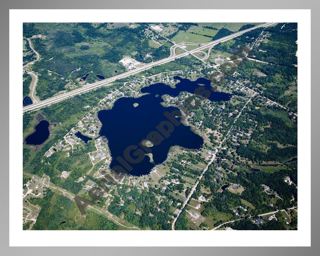 Aerial image of [4680] Runyan Lake in Livingston, MI with Silver Metal frame