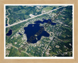 Aerial image of [4680] Runyan Lake in Livingston, MI with Natural Wood frame