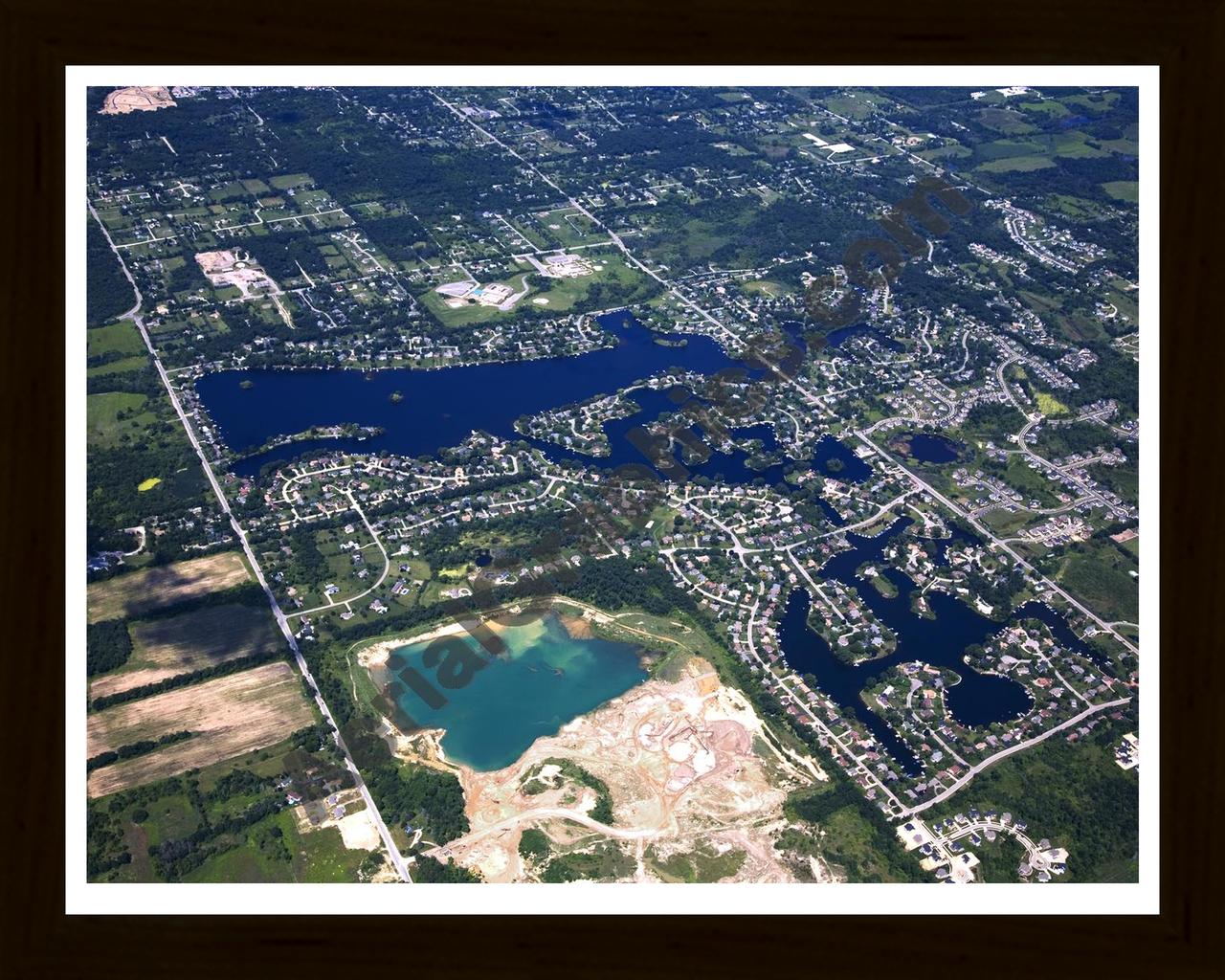 Aerial image of [4689] Lake Sherwood in Oakland, MI with Black Wood frame