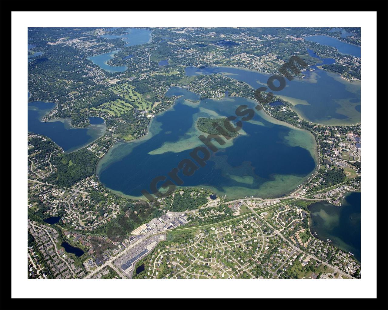 Aerial image of [4695] Orchard Lake in Oakland, MI with Black Metal frame