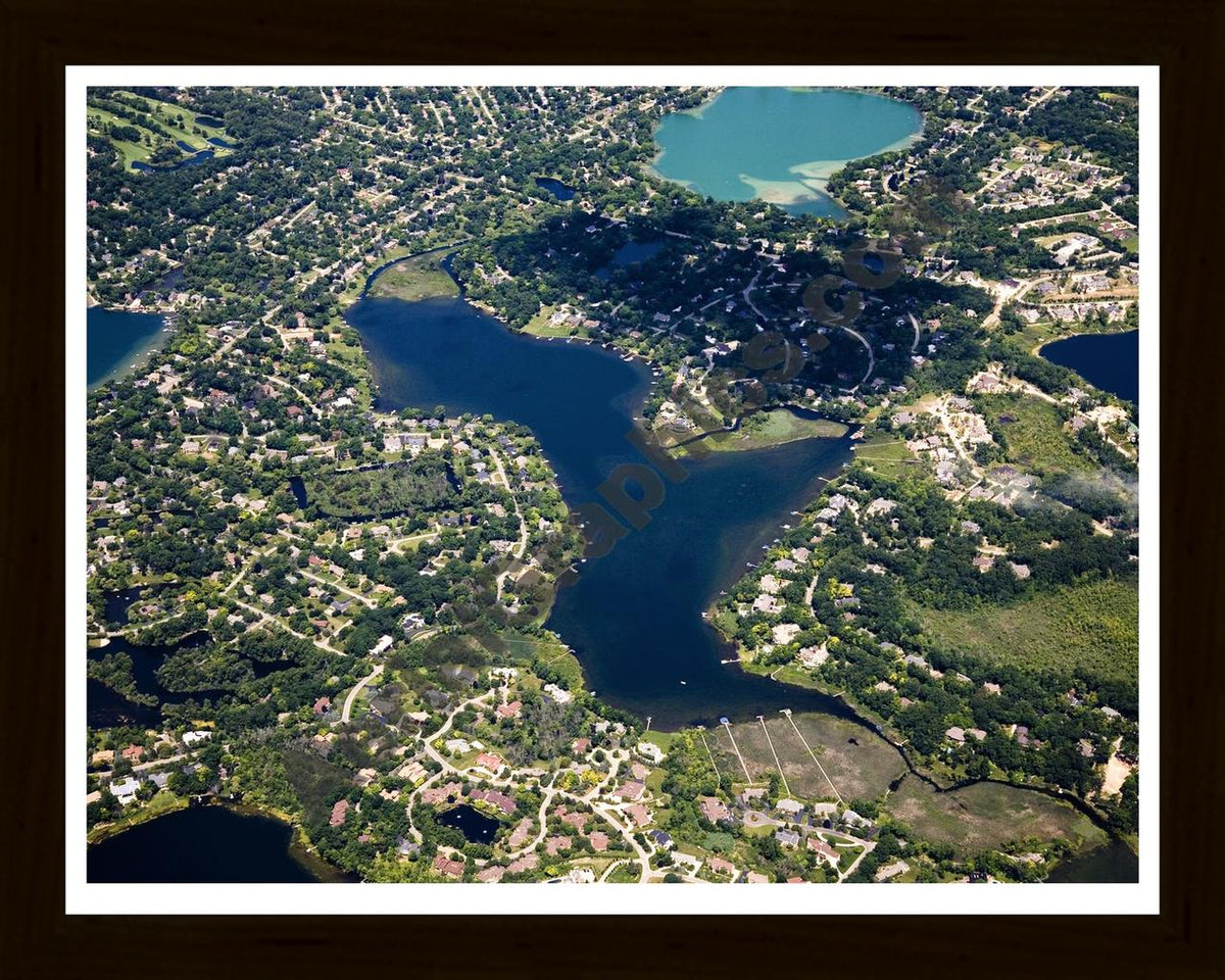 Aerial image of [4699] Upper Long Lake in Oakland, MI with Black Wood frame