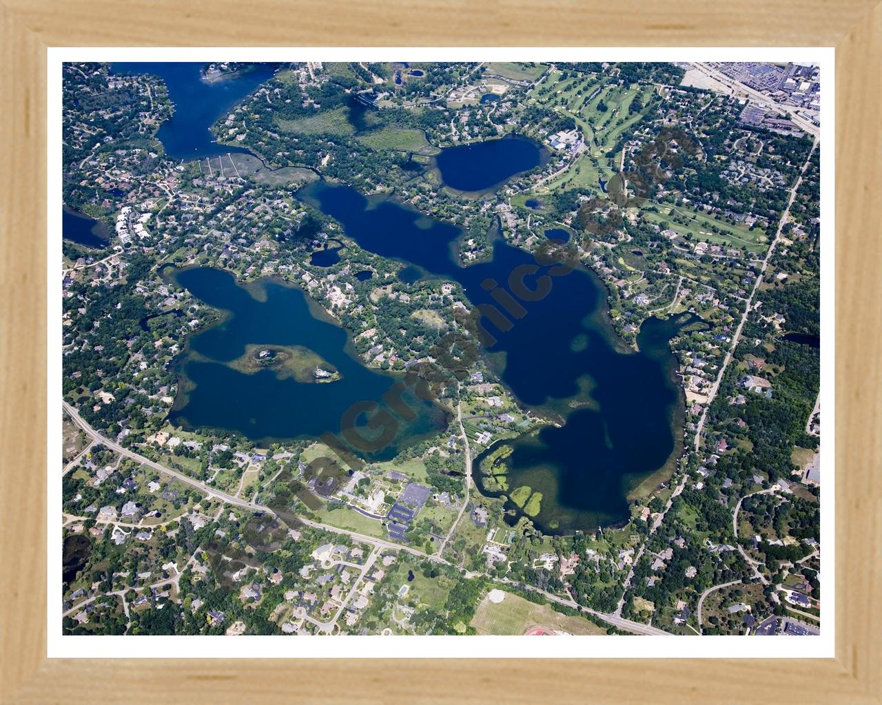 Aerial image of [4700] Lower Long Lake & Island Lake in Oakland, MI with Natural Wood frame