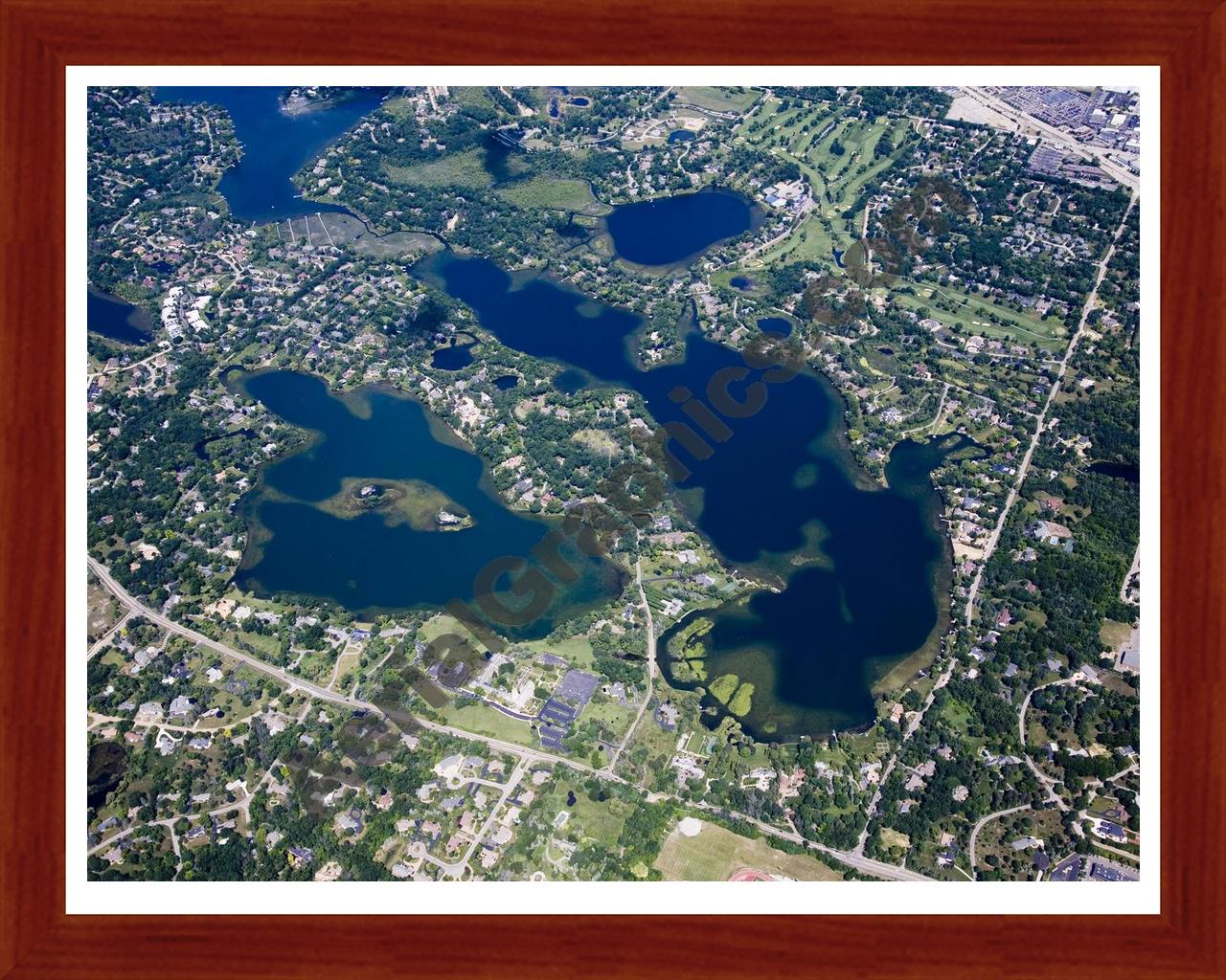 Aerial image of [4700] Lower Long Lake & Island Lake in Oakland, MI with Cherry Wood frame