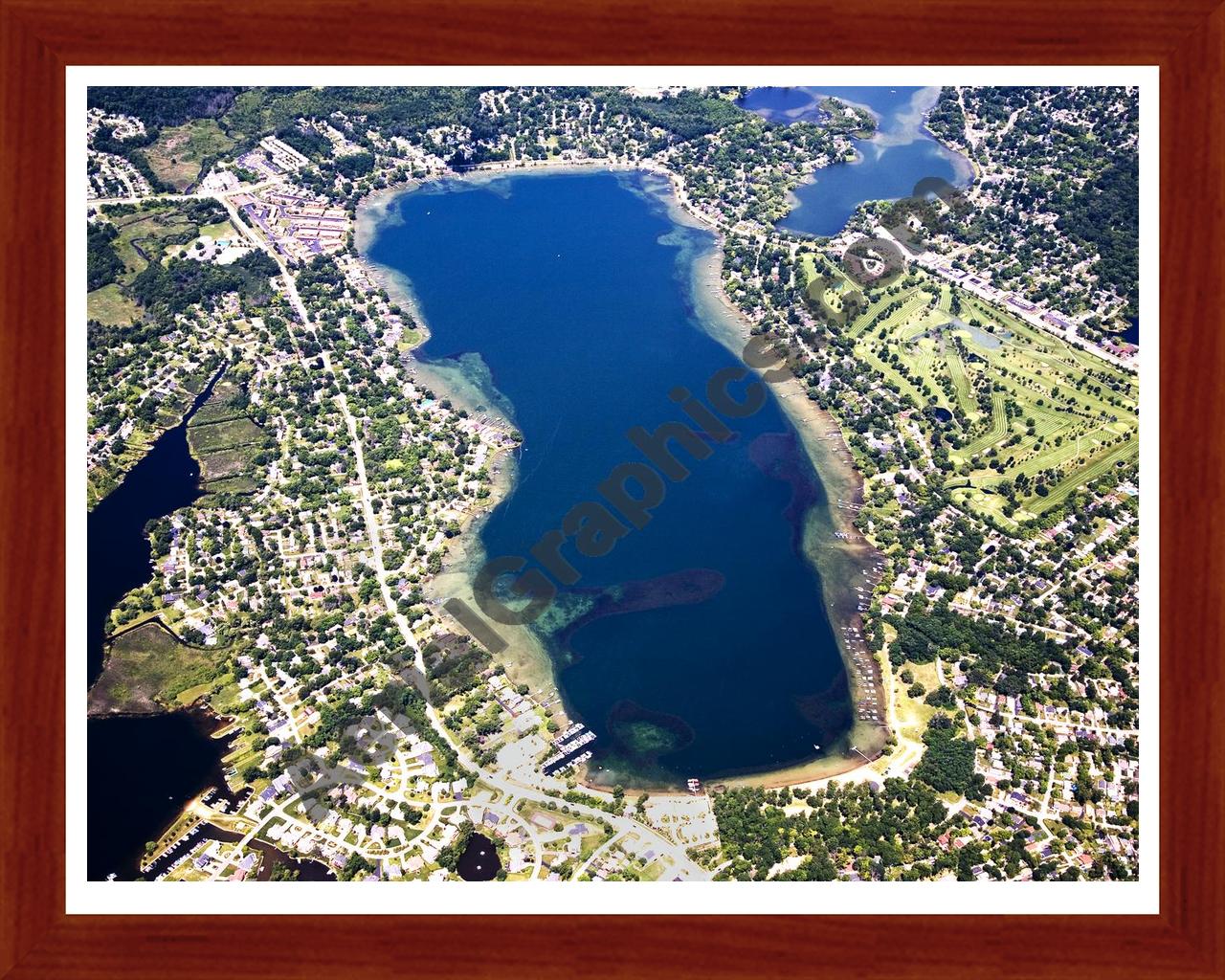 Aerial image of [4702] Elizabeth Lake in Oakland, MI with Cherry Wood frame