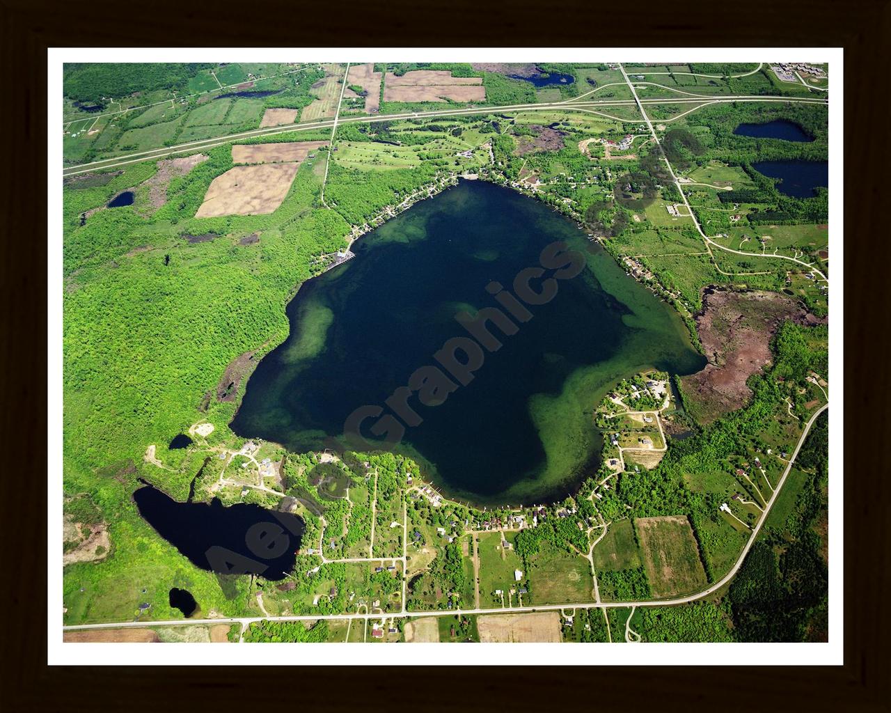 Aerial image of [4720] Nepessing Lake in Lapeer, MI with Black Wood frame