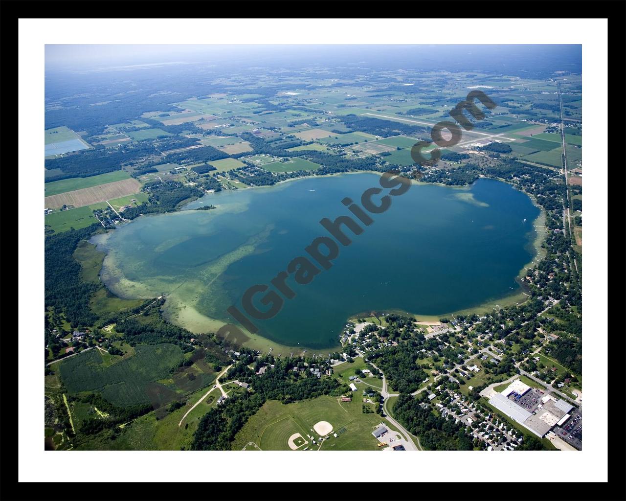 Aerial image of [4744] Fremont Lake in Newaygo, MI with Black Metal frame