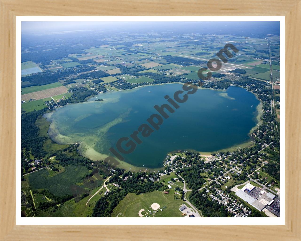 Aerial image of [4744] Fremont Lake in Newaygo, MI with Natural Wood frame