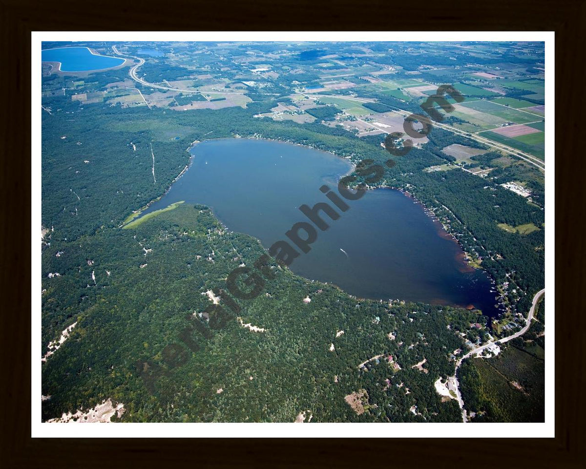 Aerial image of [4745] Bass Lake in Mason, MI with Black Wood frame