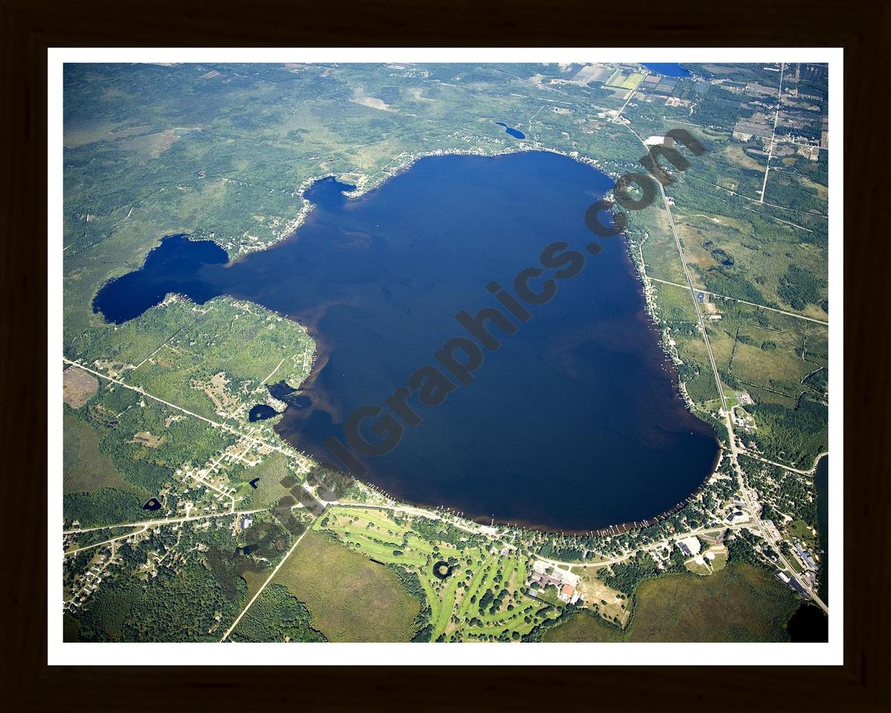 Aerial image of [4772] Lake Mitchell in Wexford, MI with Black Wood frame