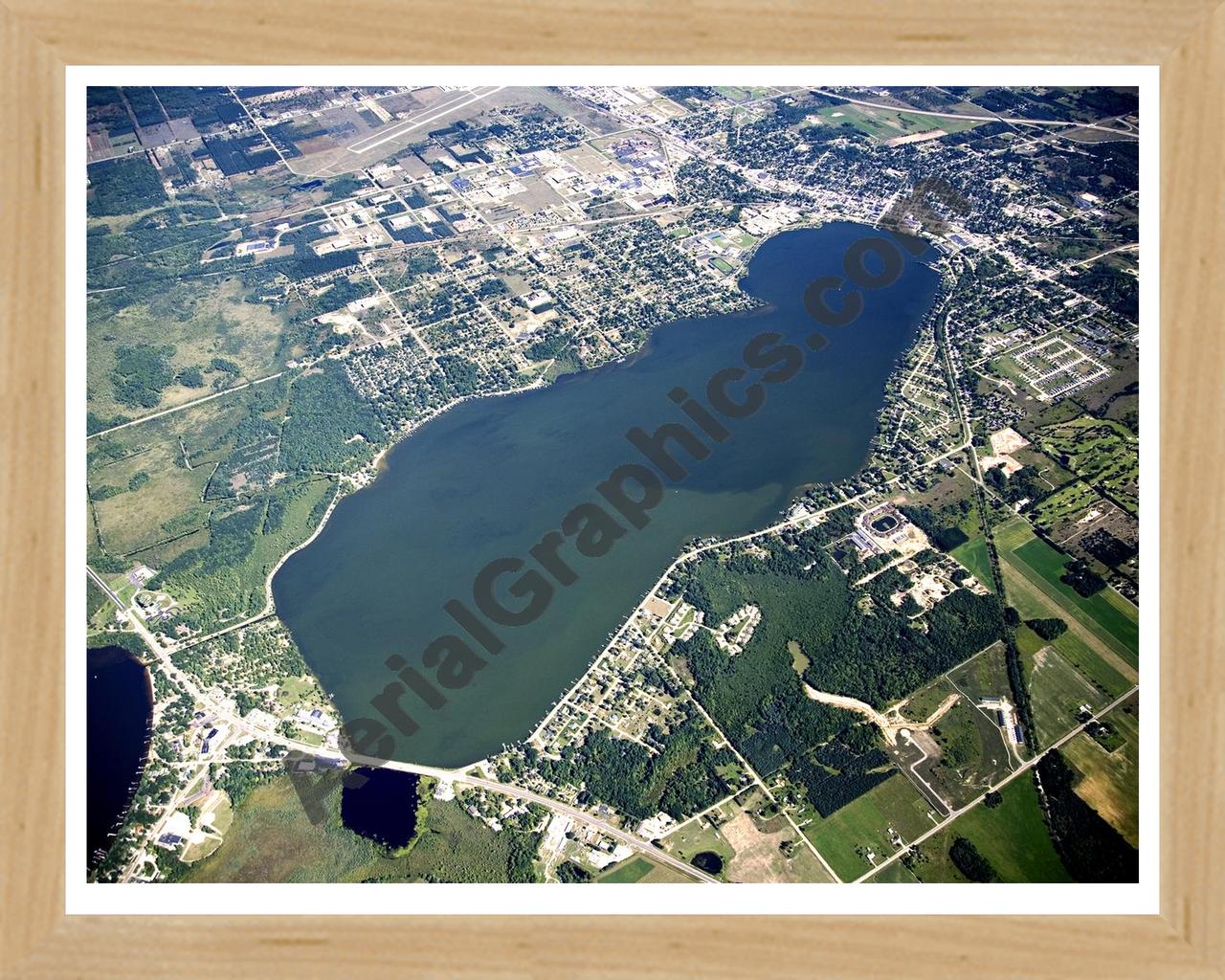 Aerial image of [4773] Lake Cadillac in Wexford, MI with Natural Wood frame