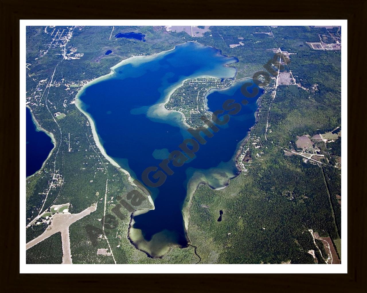 Aerial image of [4780] Duck Lake in Grand Traverse, MI with Black Wood frame